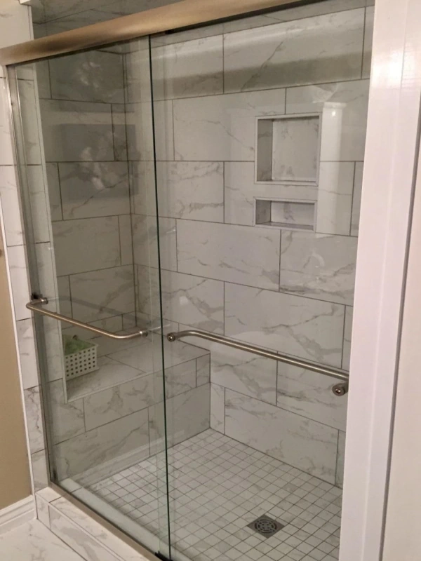 Fifth example of a semi-frameless shower door.